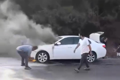 Trafikte giderken arabanın motoru alev aldı