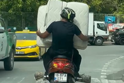 Bu da oldu! Motosikletle yatak da taşıdılar