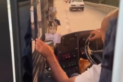 Halk otobüsü şoförü direksiyon başında video izledi