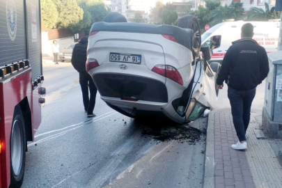 Takla atan araçtan yara almadan çıktılar
