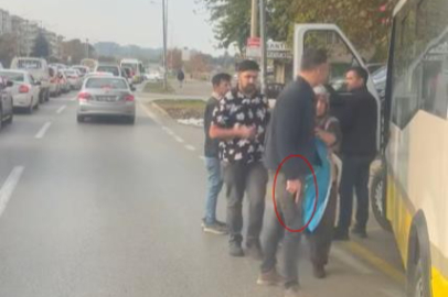 Otobüs durağına park etti, kendisini uyaran şoföre silah çekti