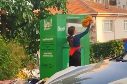 Giysi kumbarasından kıyafet çaldılar