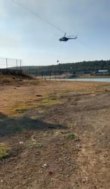 Yangına müdahale eden jandarma pilotundan büyük ustalık