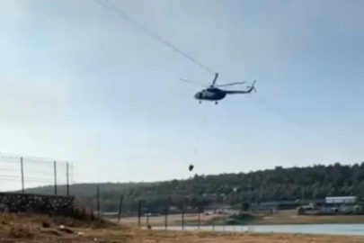 Yangına müdahale eden jandarma pilotundan büyük ustalık